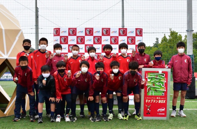 Toyo Seikan Group installed a new type of eco station "E-DOME" at the Kashima Antlers Tsukuba Academy Center and participated in the demonstration experiment of the plastic bottle cap collection machine "Captain BOX"